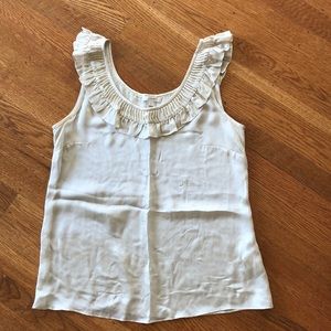 Gold tank with ruffle neck